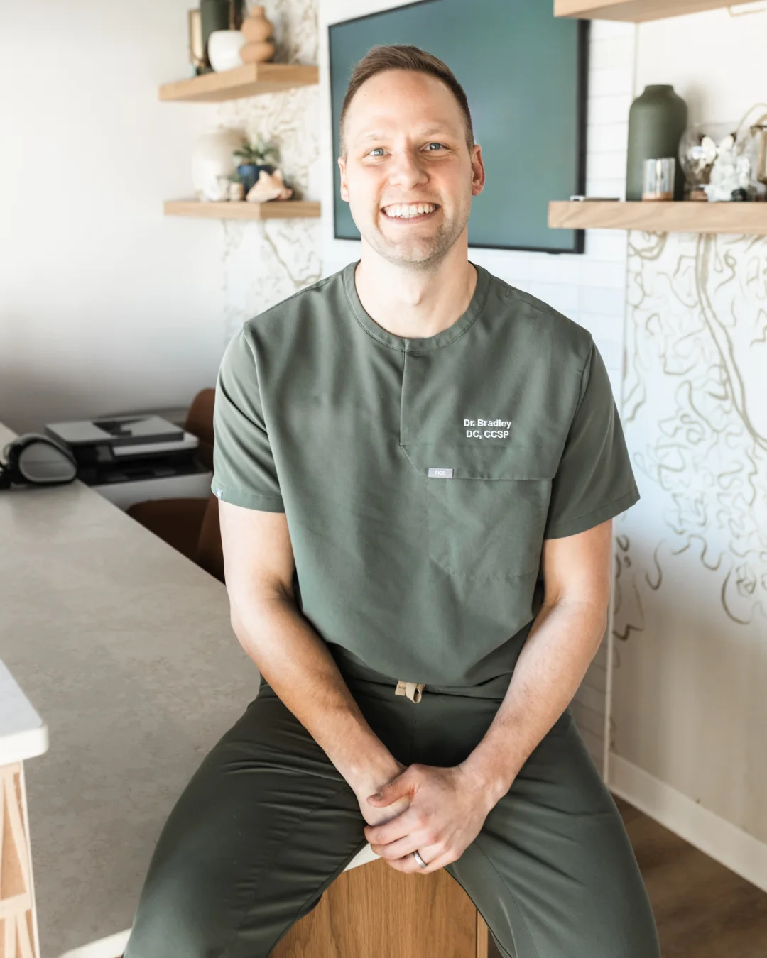 Dr. Bradley Brunner seated in his office.